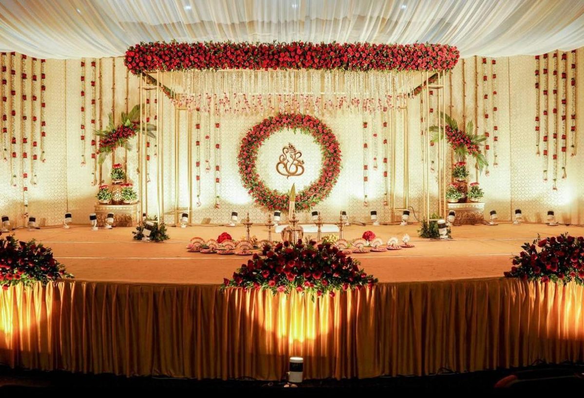 An elegant Mandap adorned with soft floral accents and timeless wedding details